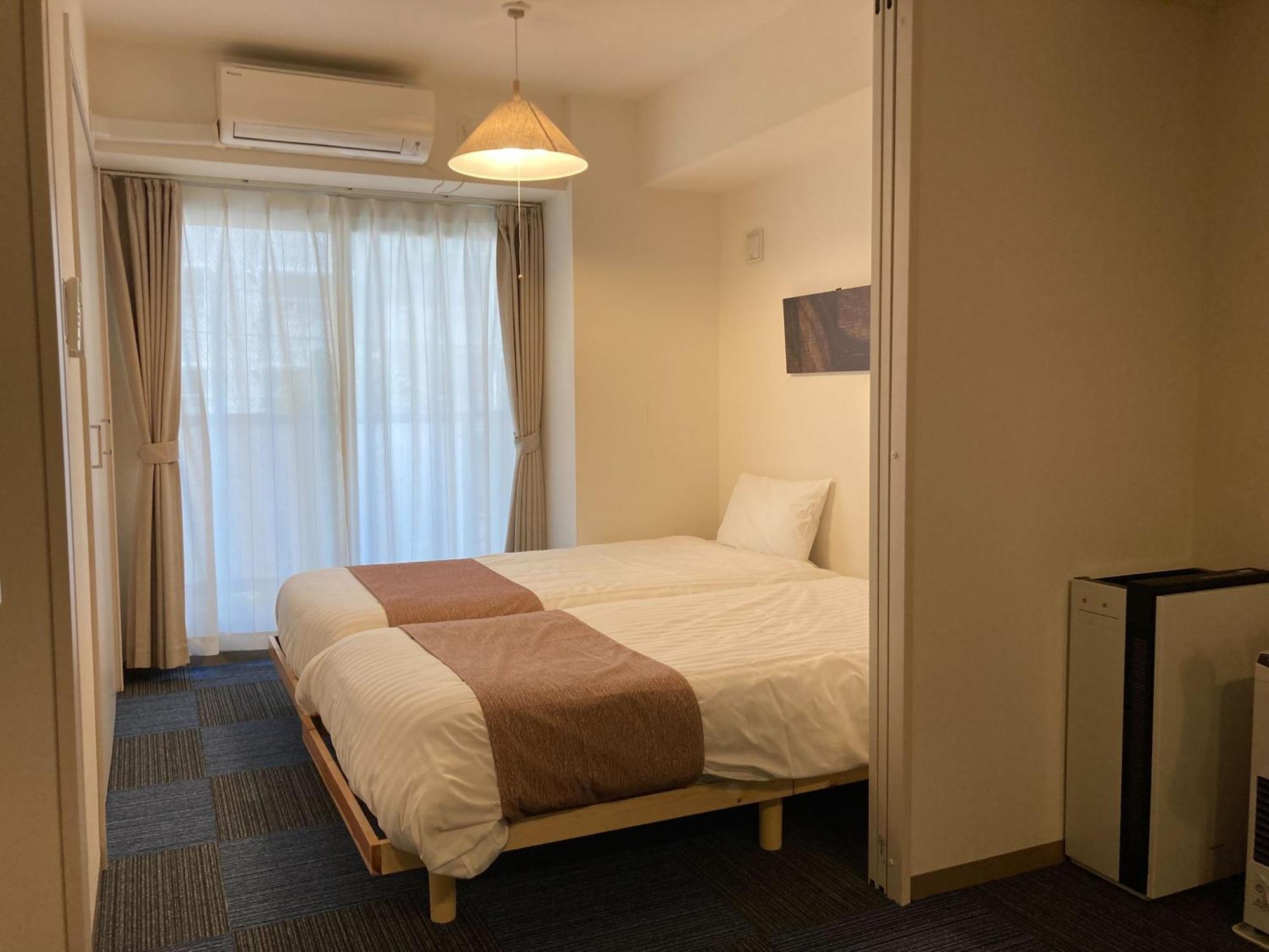 Apartamento Tsubaki Garden Sapporo Habitación foto