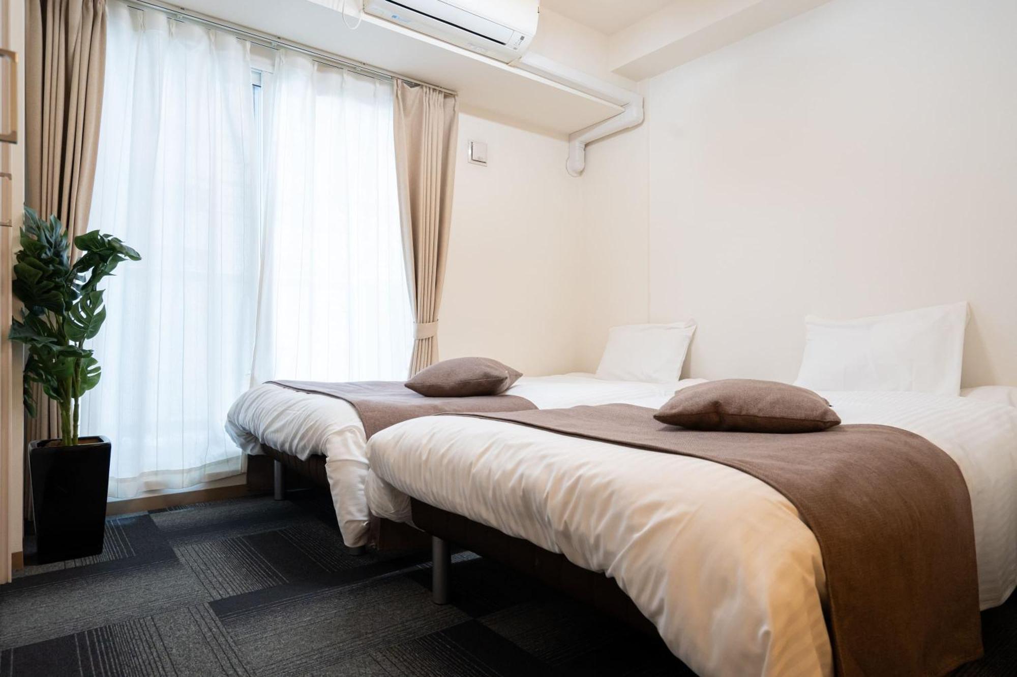 Apartamento Tsubaki Garden Sapporo Habitación foto