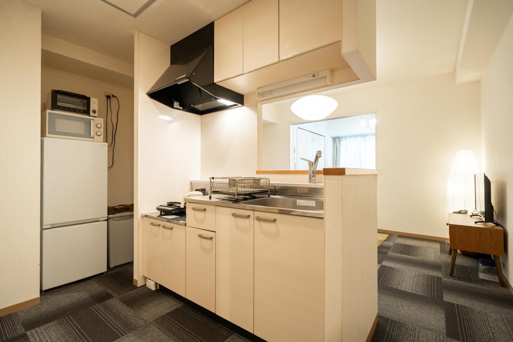 Apartamento Tsubaki Garden Sapporo Habitación foto